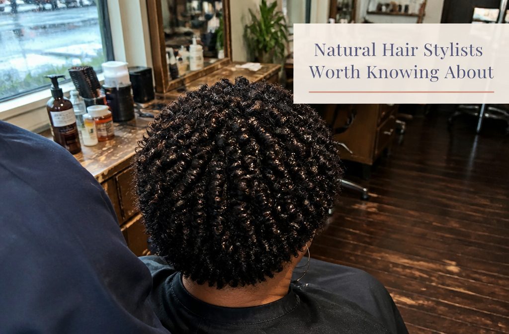 Stylist working with a client’s natural curls